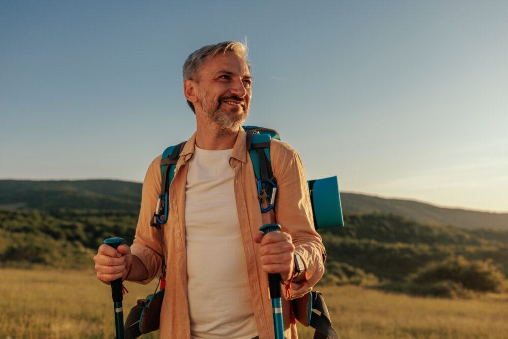 a male hiker unwinds after his trek